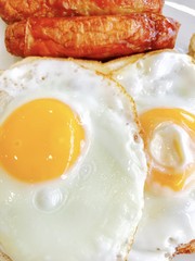 Fried eggs with sausage 
