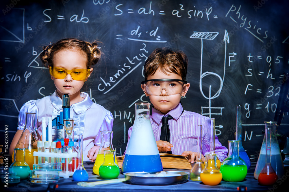 Wall mural young scientists in a lab