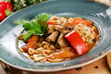 Noodles with mutton and vegetables. Central Asian cuisine. Lagman