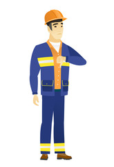 Disappointed asian builder with thumb down