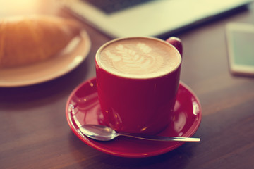 latte with laptop and vintage tone