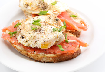 Traditional Norwegian breakfast. Sandwich eggs with salted fish and onions.