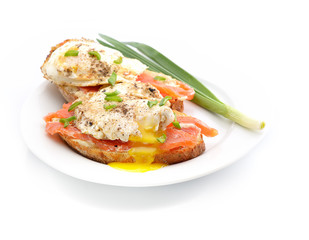 Traditional Norwegian breakfast. Sandwich eggs with salted fish and onions.