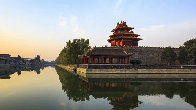 Time-lapse: China Beijing, the Palace Museum (Forbidden City), outer moat at sunrise.