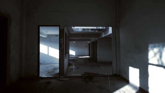Walking inside an industrial abandoned building
