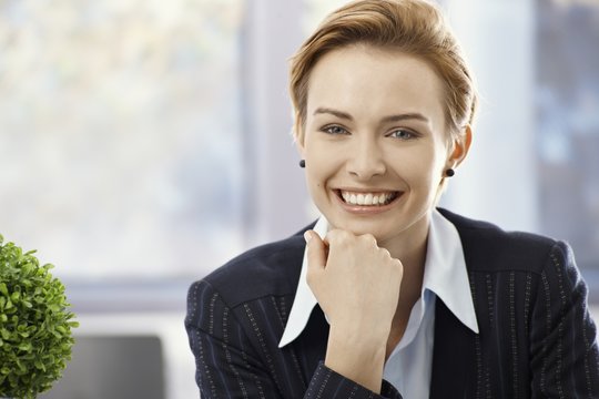 Closeup portrait of happy businesswoman
