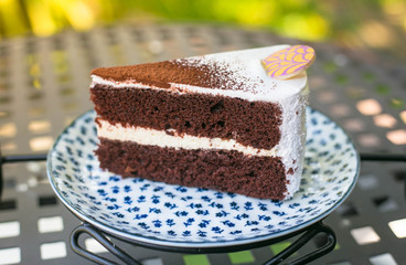 Close up of a part of cake in coffee shop.