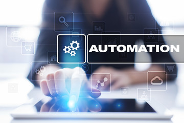 Woman using tablet pc, pressing on virtual screen and selecting automation.