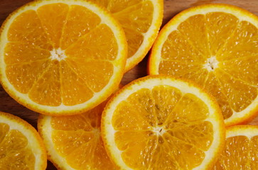 Background of sliced  juicy oranges fruit