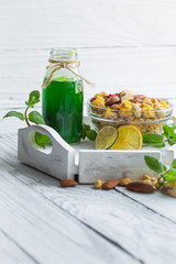 healthy Breakfast of fresh juice and muesli with nuts