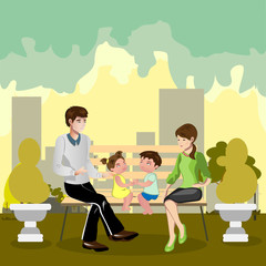 Family sitting in a park