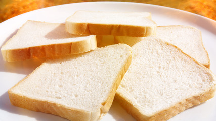 slices of toast bread on white plate.