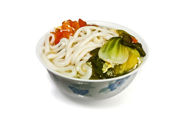 A bowl with tomato, vegetable, udon in white background