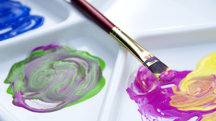 Obraz premium brush and paint with color palette.