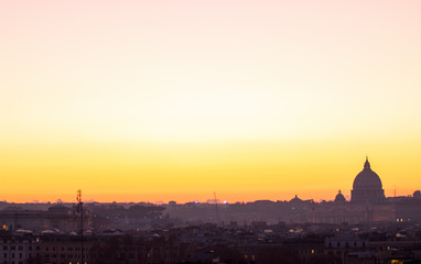 Fototapeta na wymiar Panorama view of Rome at sunset with St Peter Cathedral