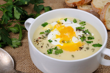 potato cream soup with poached eggs