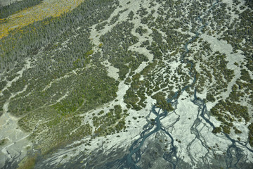 aerial photo with river mouth, sandbanks and thicket in alaska