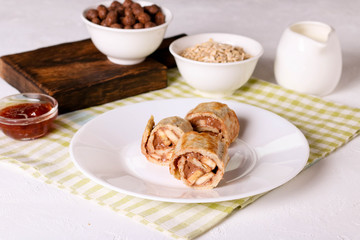 crepes with chocolate filling and banana, horizontal