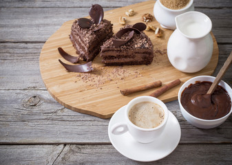 Chocolate cake on old wooden table