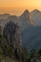 Obraz na płótnie Canvas Landscape of Huangshan (Yellow Mountains). Huangshan Pine trees. Located in Anhui province in eastern China. It is a UNESCO World Heritage Site, and one of China's major tourist destinations.