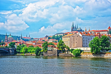 Fototapeta na wymiar Embankment of Vltava River with Old town in Prague