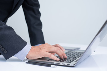 Businessman working on laptop computer