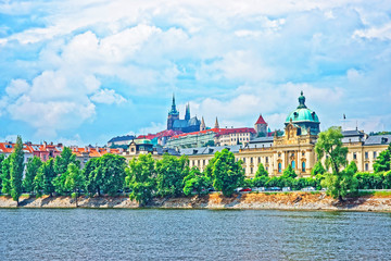 Vltava River embankment with Prague Old Town and Strakova Academy