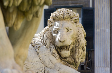 Naklejka premium Marble lions at a small square in Naples, Italy