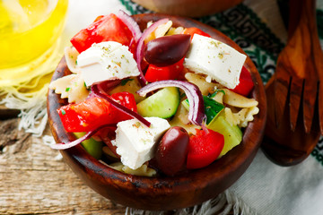 Greek pasta salad.style rustic.selective focus