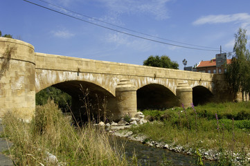 Oja river and medieval bridge of Casalareina, La Rioja, Spain