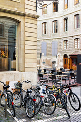 Fototapeta na wymiar Bicycles in Street in Geneva