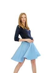 beautiful young blonde girl in blue dress and blouse