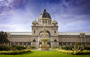 Royal Exhibition Building behind Carlton Gardens in Melbourne, Victoria, Australia. First building...