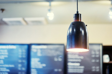 Light, bulb and lantern. Cafe and bar interior.