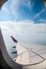 Aircraft Wing From the windows in the plane | Travel holiday business