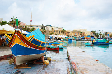 Luzzu colorful boat at Marsaxlokk Harbor Malta