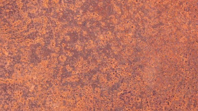 movement the camera along the texture of rusty metal