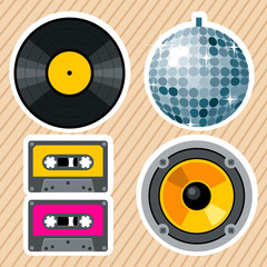 Retro styled set of vintage musical party equipment. Old fashioned vinyl record, Shiny disco ball, pair of old school cassettes and Loudspeaker icon. 