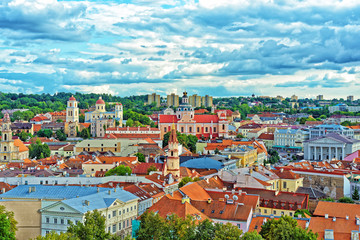 Obraz premium Old town in Vilnius with churches steeples and Town Hall