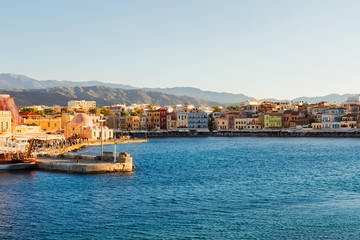 Fototapeta na wymiar venetian habour of Chania with historical houses at sunny summer day, Crete, Greece