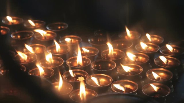 Many oil lamps with fire