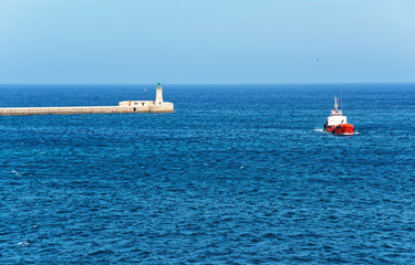 Fototapeta premium Ship at Breakwaters of St Elmo at Grand Harbor Valletta