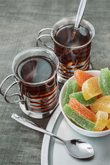 Tea and jelly candies.