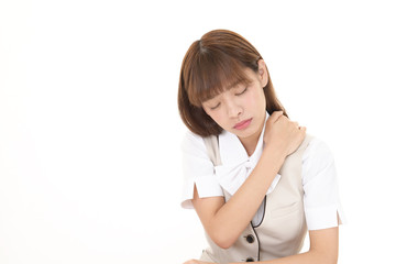 肩こりに悩むビジネスウーマン