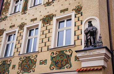 Statue as decoration on building on Market Square in Poznan
