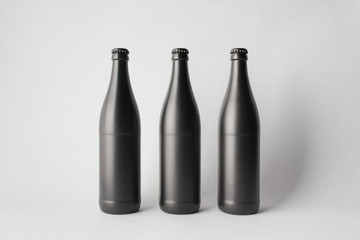 Three beer bottles on the scene, mock-up.