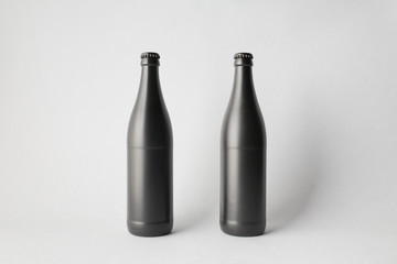 Two beer bottles on the scene, mock-up.
