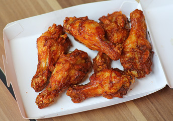 Hot and Spicey Buffalo Chicken Wings in cardboard delivery box