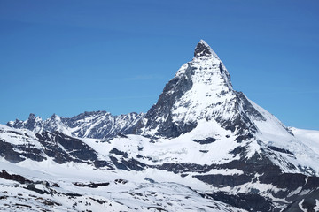 Fototapeta na wymiar Scenic view on Matterhorn peak in snow ,Switzerland
