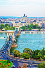 Obraz premium Chain Bridge above Danube River and Saint Stephen Basilica Budapest
